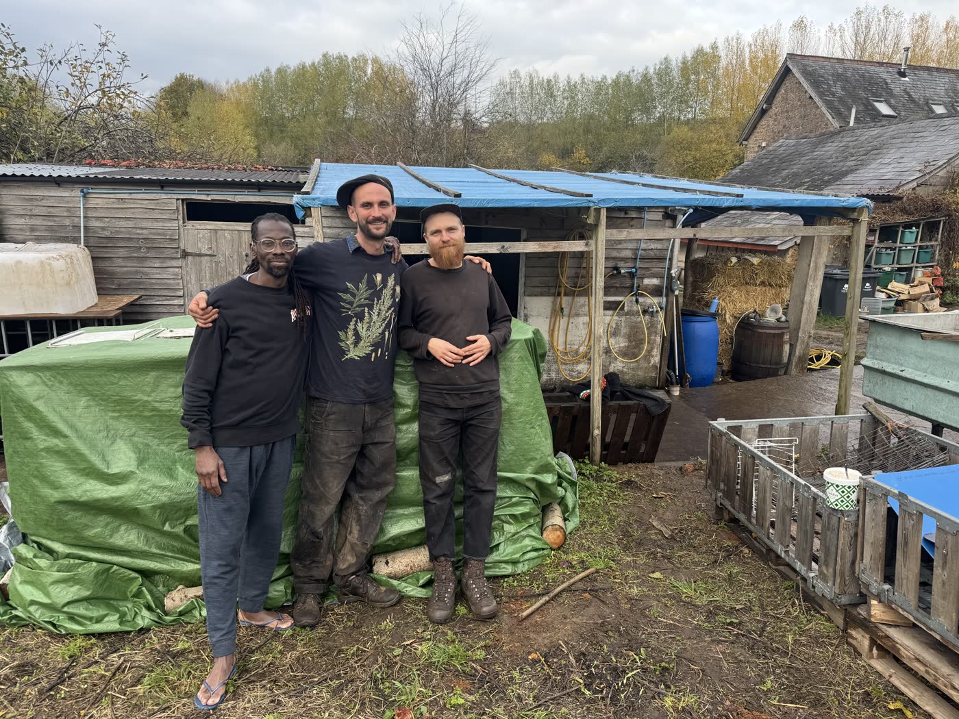 Members of the 96 team standing together at the farm