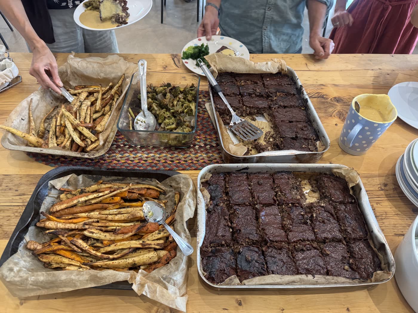 Trays of home‑baked food laid out for an event